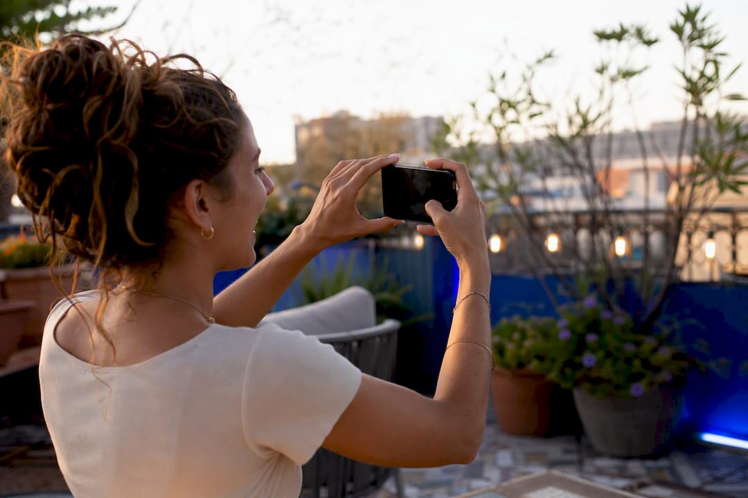 Person recording Instagram Reel on smartphone